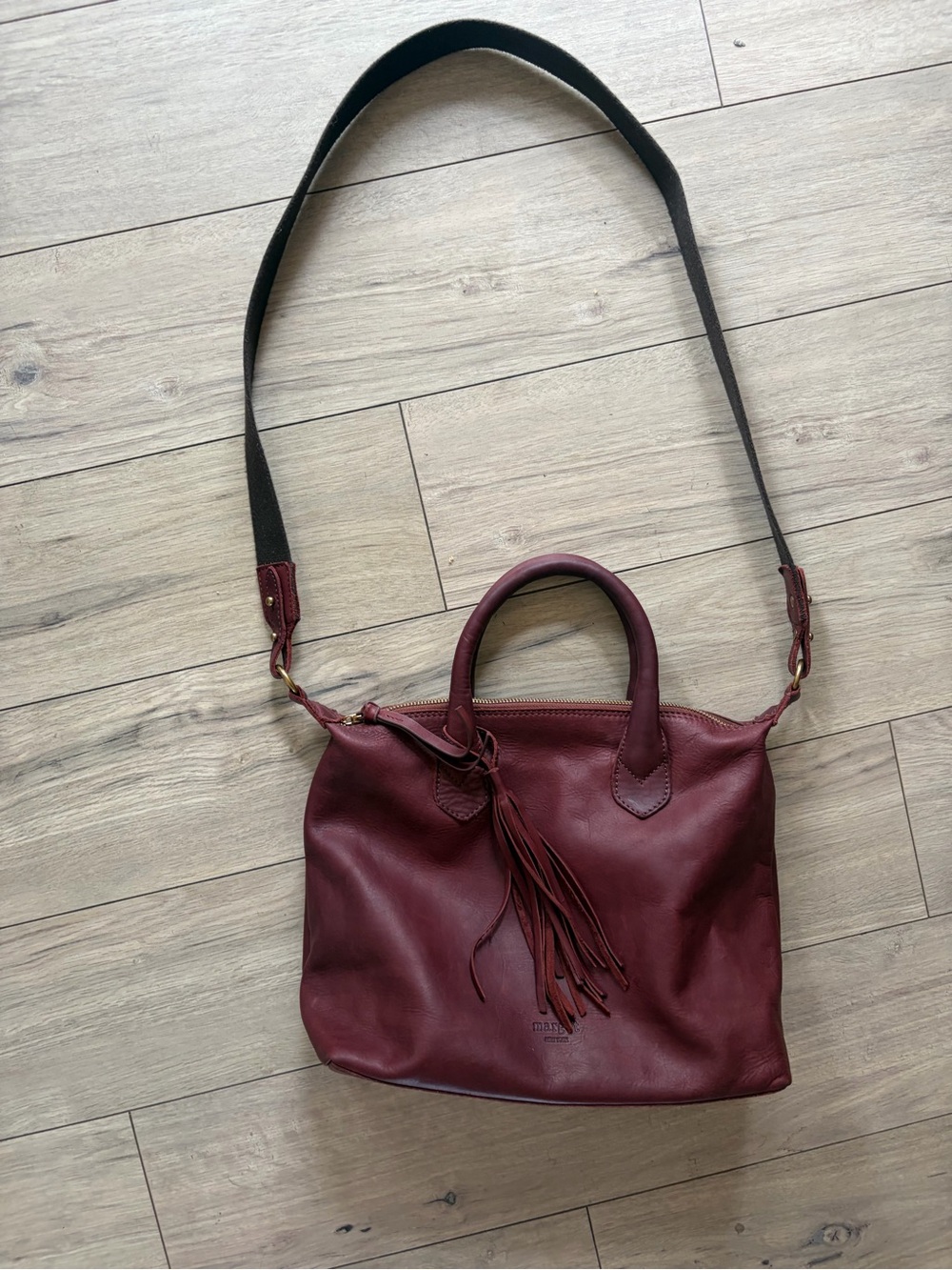 Women's Leather Shoulder Bag in Deep Burgundy with Tassel Accent